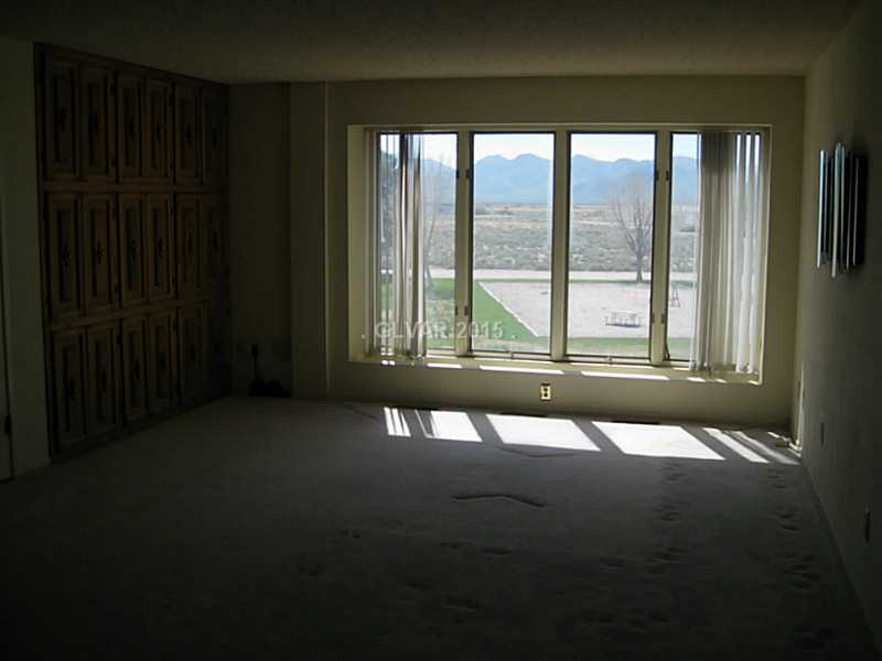 719 Luscombe Avenue Sandy Valley, NV 89019 - Photo 27 of 34 Den.