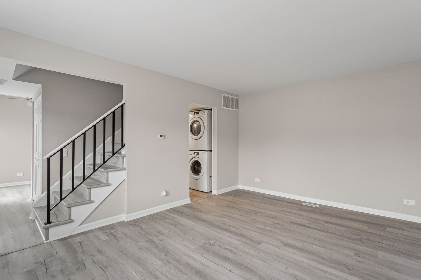 4 Tower Court Downers Grove, IL 60516 - Photo 5 of 20 a view of an empty room with wooden floor