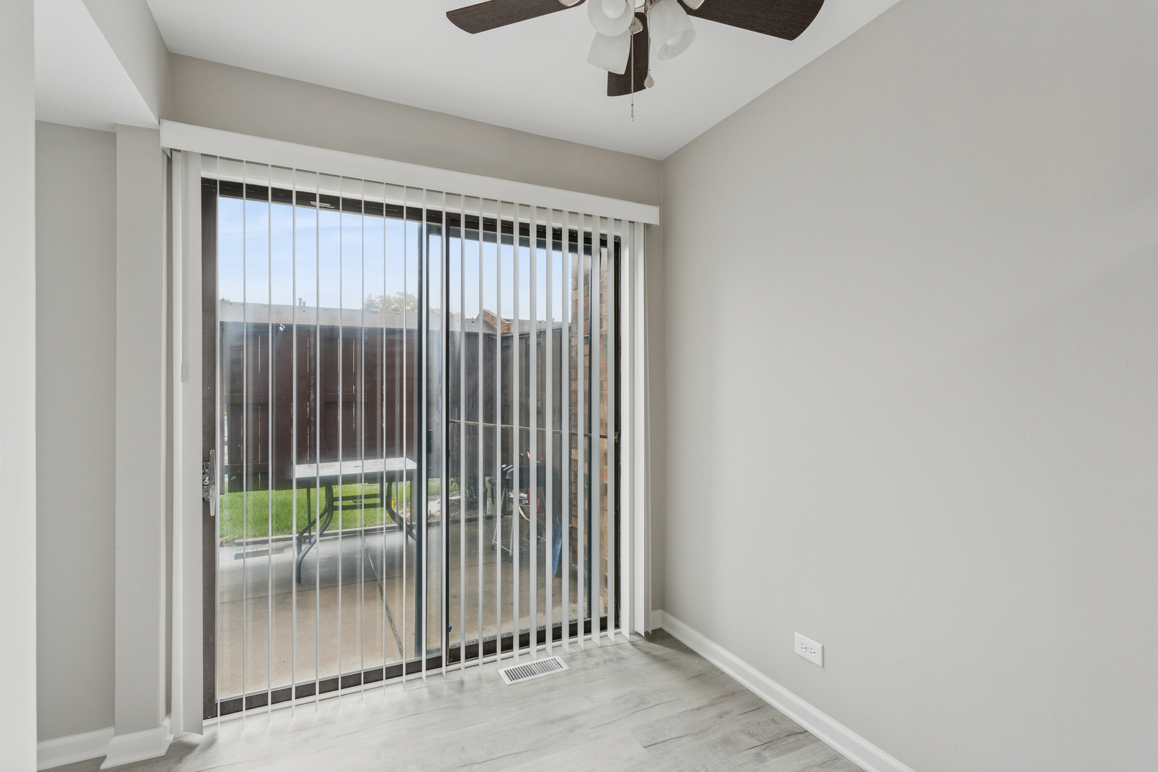 4 Tower Court Downers Grove, IL 60516 - Photo 6 of 20 an empty room with windows