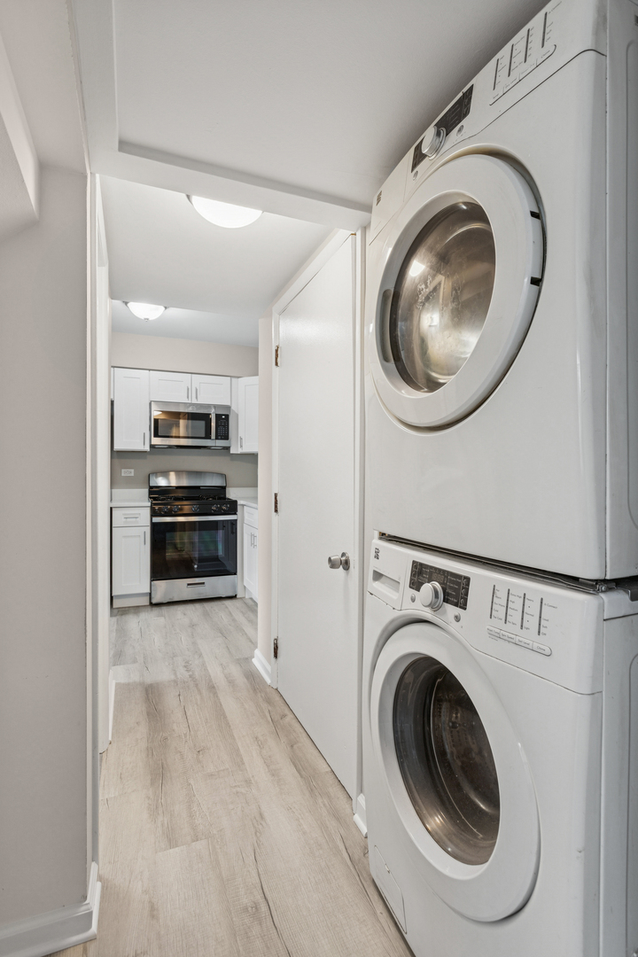 4 Tower Court Downers Grove, IL 60516 - Photo 10 of 20 a view of a storage and utility room with washer and dryer