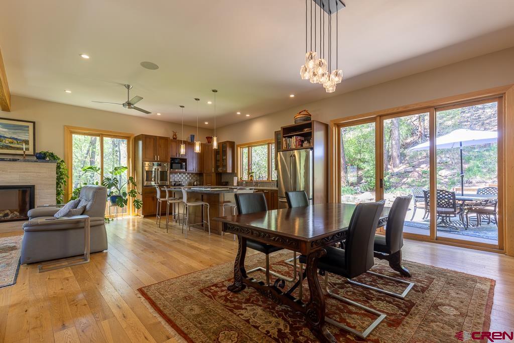 7041 County Road 203 Durango, CO 81301 - Photo 14 of 45 a view of a livingroom with furniture window and wooden floor