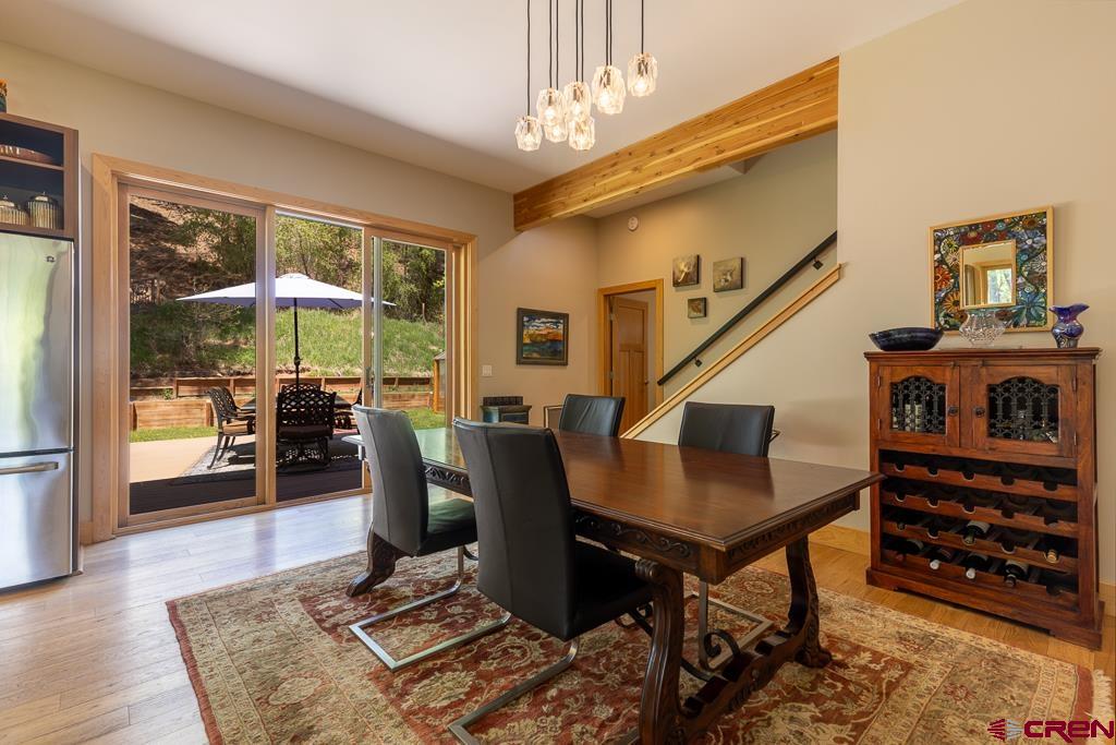 7041 County Road 203 Durango, CO 81301 - Photo 19 of 45 a living room with furniture and a chandelier