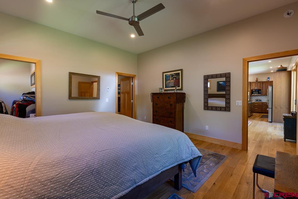7041 County Road 203 Durango, CO 81301 - Photo 22 of 45 a bed room with a bed and furniture