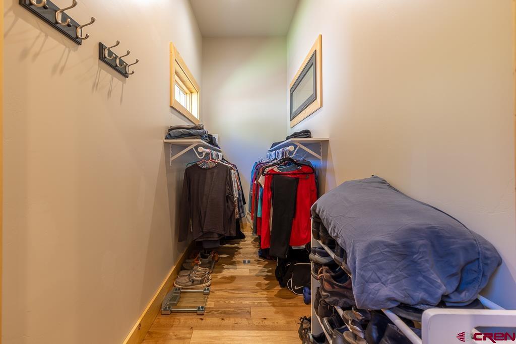 7041 County Road 203 Durango, CO 81301 - Photo 24 of 45 a view of walk in closet with clothes