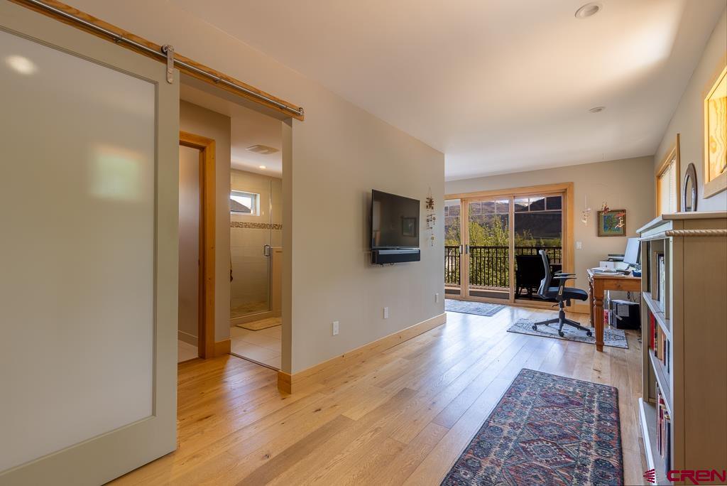 7041 County Road 203 Durango, CO 81301 - Photo 26 of 45 a view of a livingroom with furniture and a flat screen tv