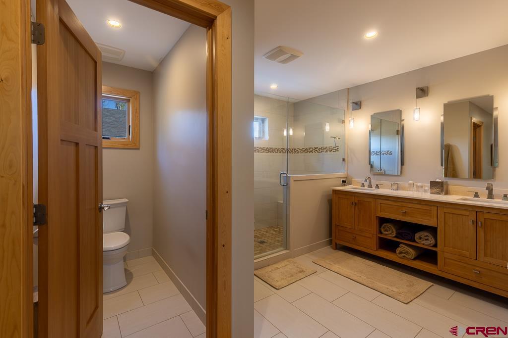 7041 County Road 203 Durango, CO 81301 - Photo 27 of 45 a bathroom with a sink and a mirror