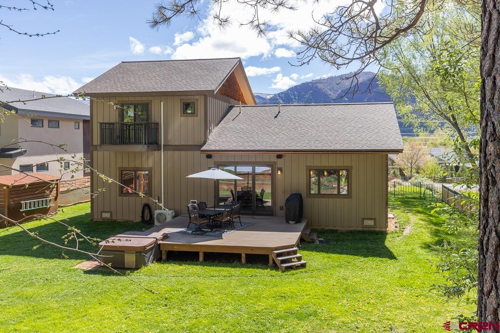 7041 County Road 203 Durango, CO 81301 - Photo 36 of 45 a front view of a house with garden