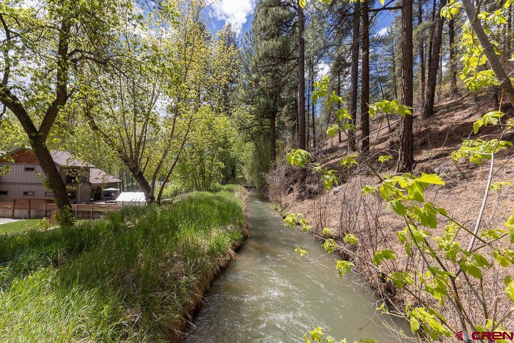 7041 County Road 203 Durango, CO 81301 - Photo 42 of 45 a backyard of a house with lots of green space