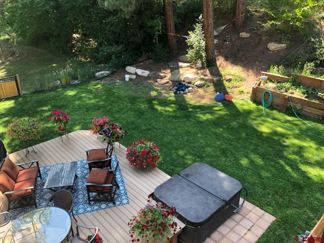 7041 County Road 203 Durango, CO 81301 - Photo 44 of 45 a view of a table and chairs in backyard of the house