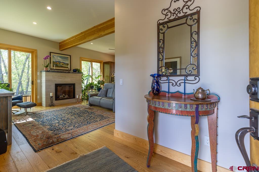 7041 County Road 203 Durango, CO 81301 - Photo 10 of 45 a living room with furniture and a fireplace