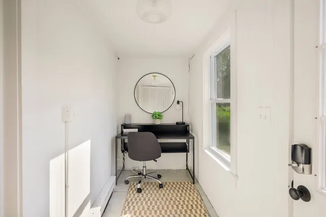 a bathroom with a toilet a sink and bathtub