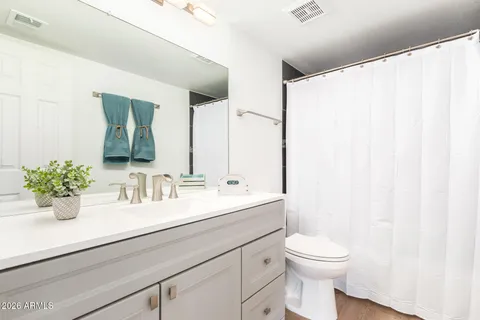 a view of a hallway with washer and dryer