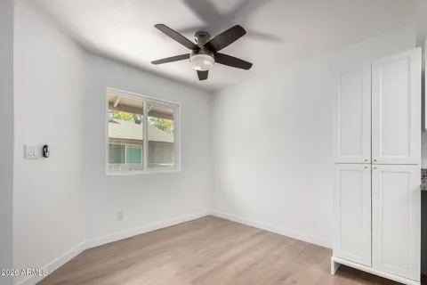 a kitchen with sink a window and appliances