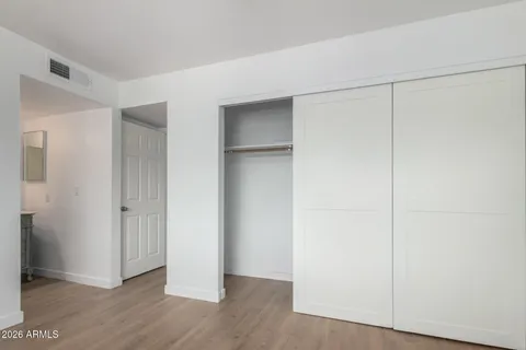 a bathroom with a shower and a sink