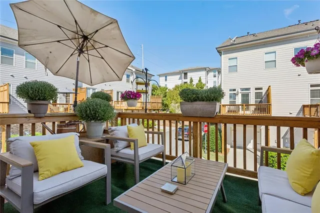 a view of a two chairs in the deck