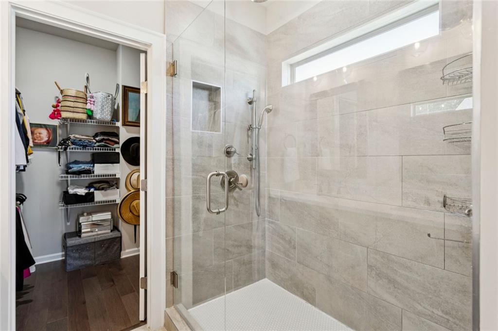 4219 Deming Circle Sandy Springs, GA 30342 - Photo 29 of 40 a bathroom with a shower