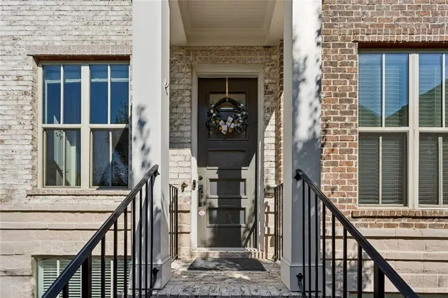 a view of a balcony with wooden floor and stairs