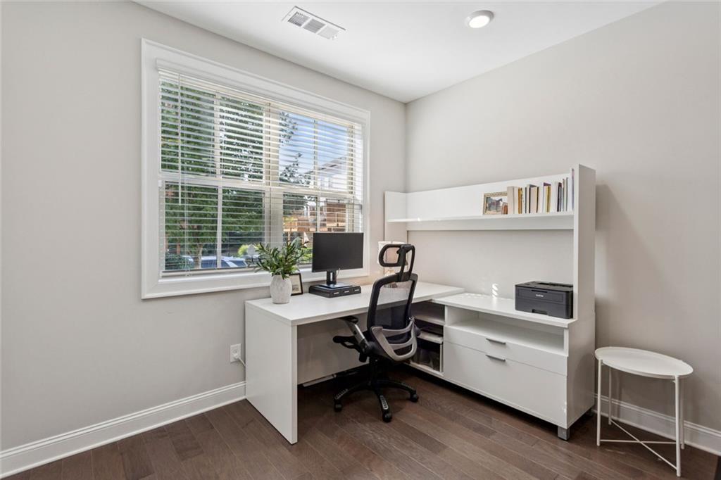 4219 Deming Circle Sandy Springs, GA 30342 - Photo 37 of 40 a view of a workspace with furniture and a window