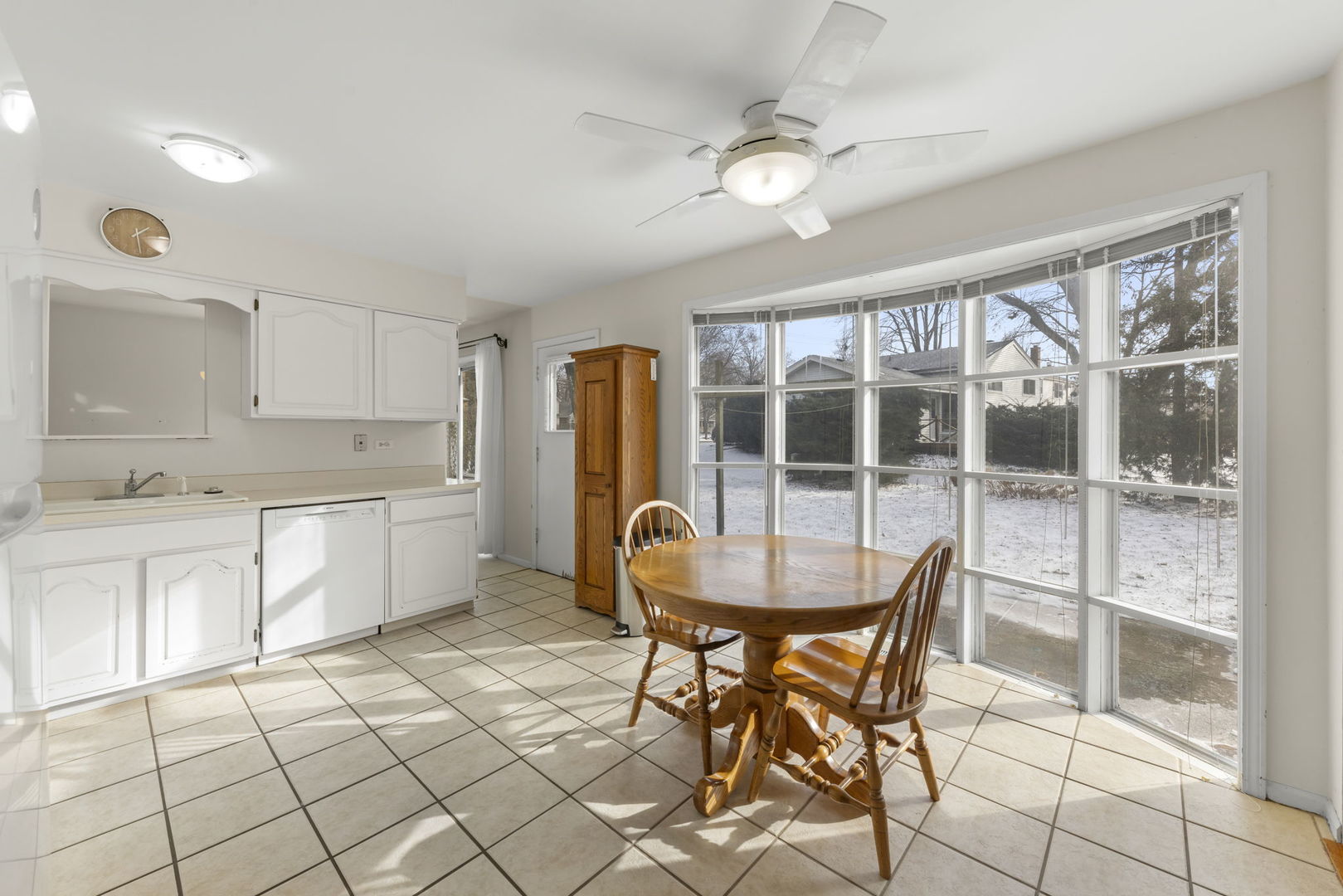 1308 Stonegate Road Naperville, IL 60540 - Photo 6 of 30 a kitchen with a sink a counter space and appliances