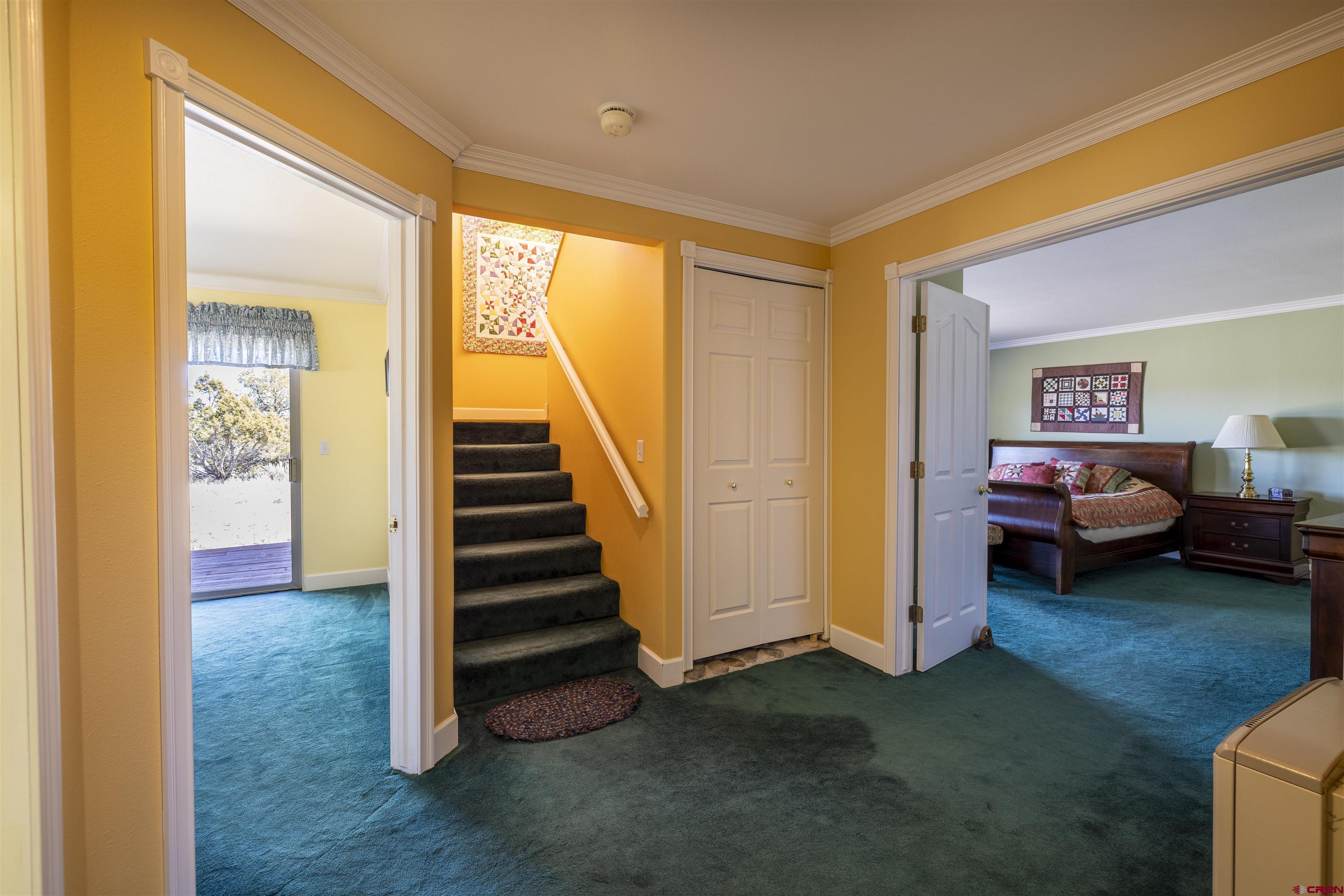 63 Sagewood Drive Ignacio, CO 81137 - Photo 17 of 33 a view of a livingroom with furniture and staircase