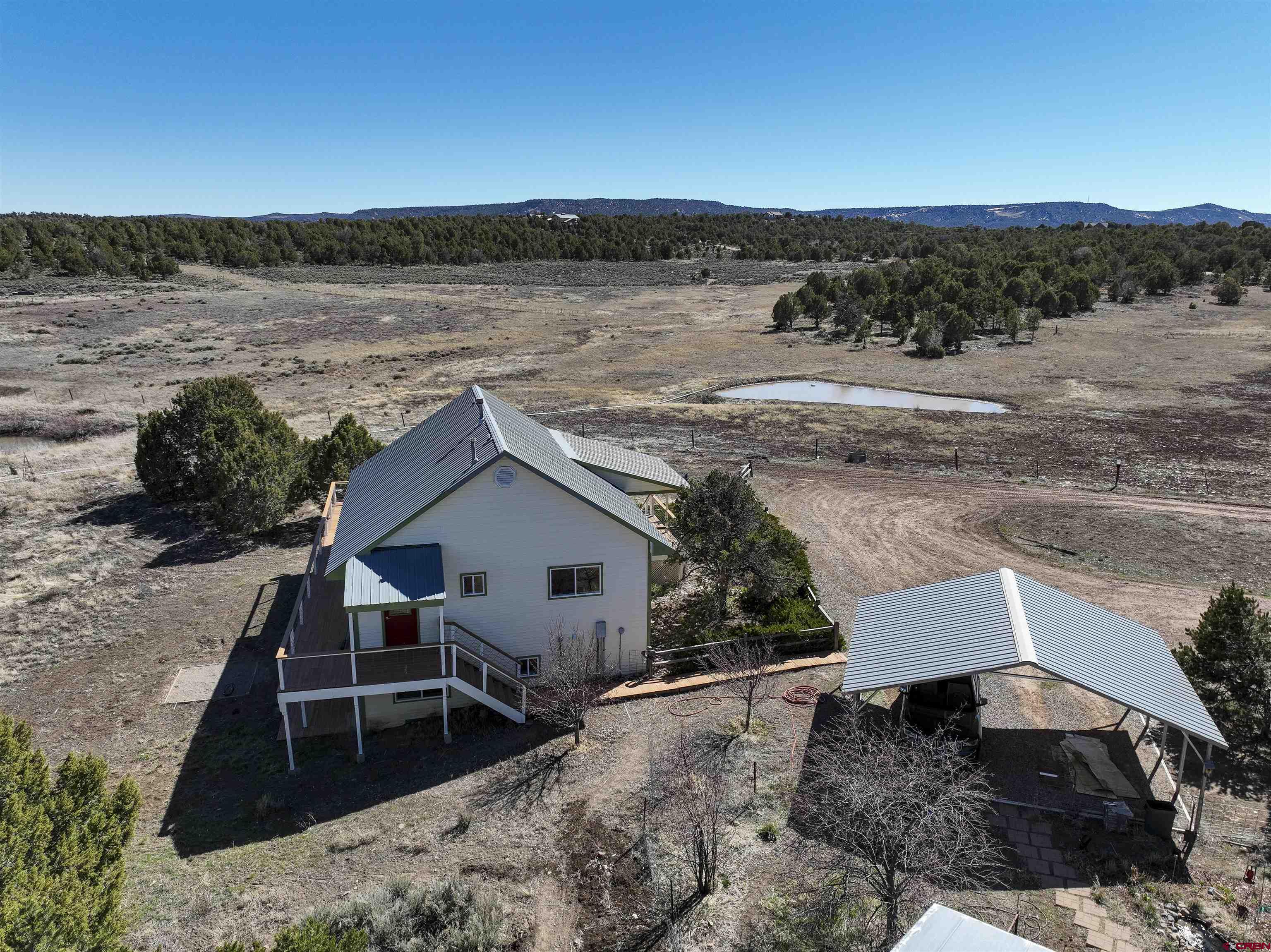 63 Sagewood Drive Ignacio, CO 81137 - Photo 4 of 33 a view of a lake with a mountain in the background