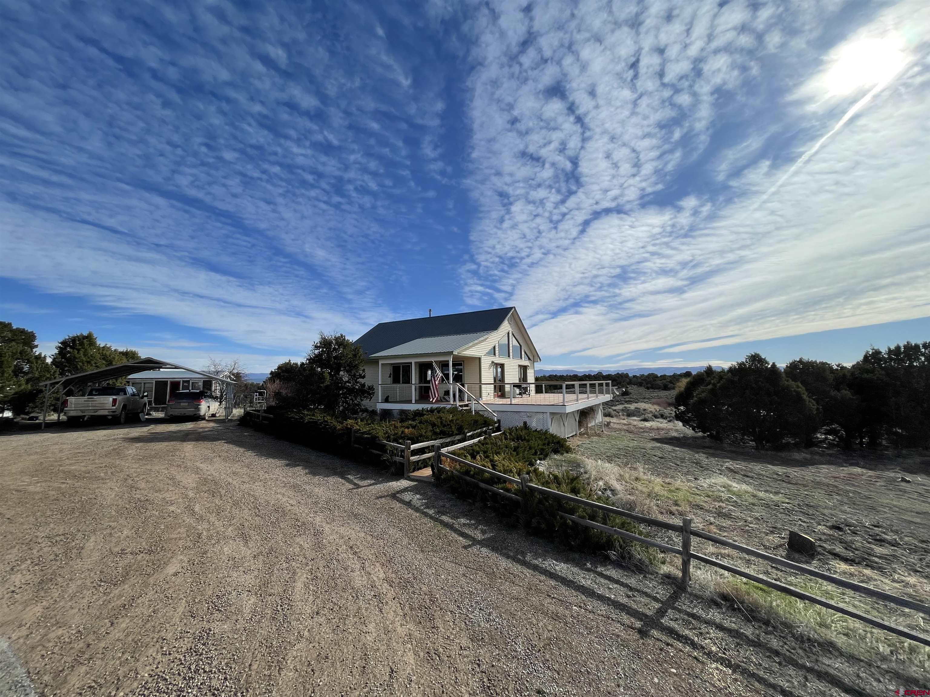 63 Sagewood Drive Ignacio, CO 81137 - Photo 5 of 33 a view of a car parked on the side of the road