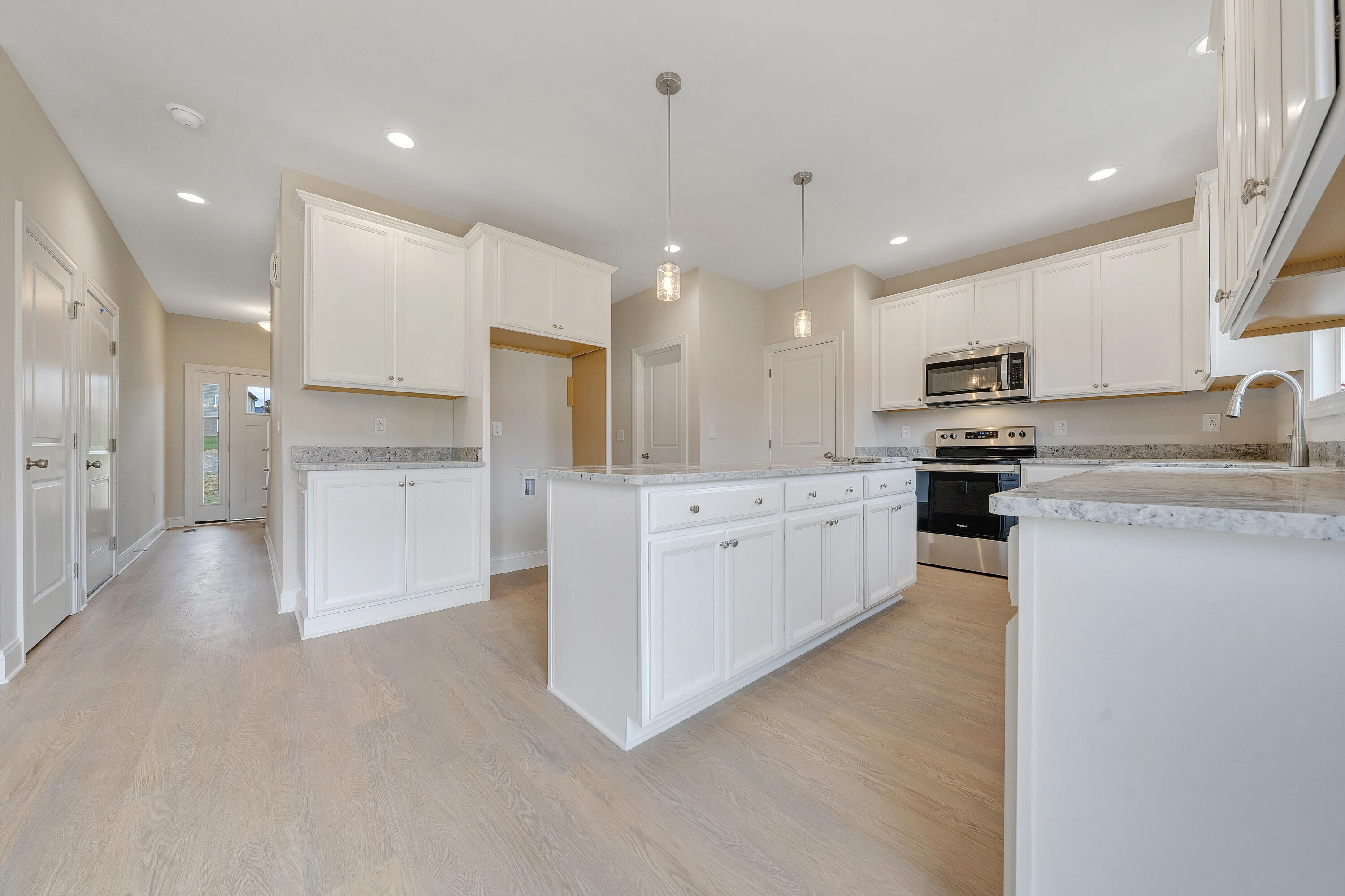 5275 Arrowhead Trail Salem, VA 24153 - Photo 6 of 18 a large kitchen with stainless steel appliances kitchen island granite countertop a stove a sink a refrigerator and a refrigerator