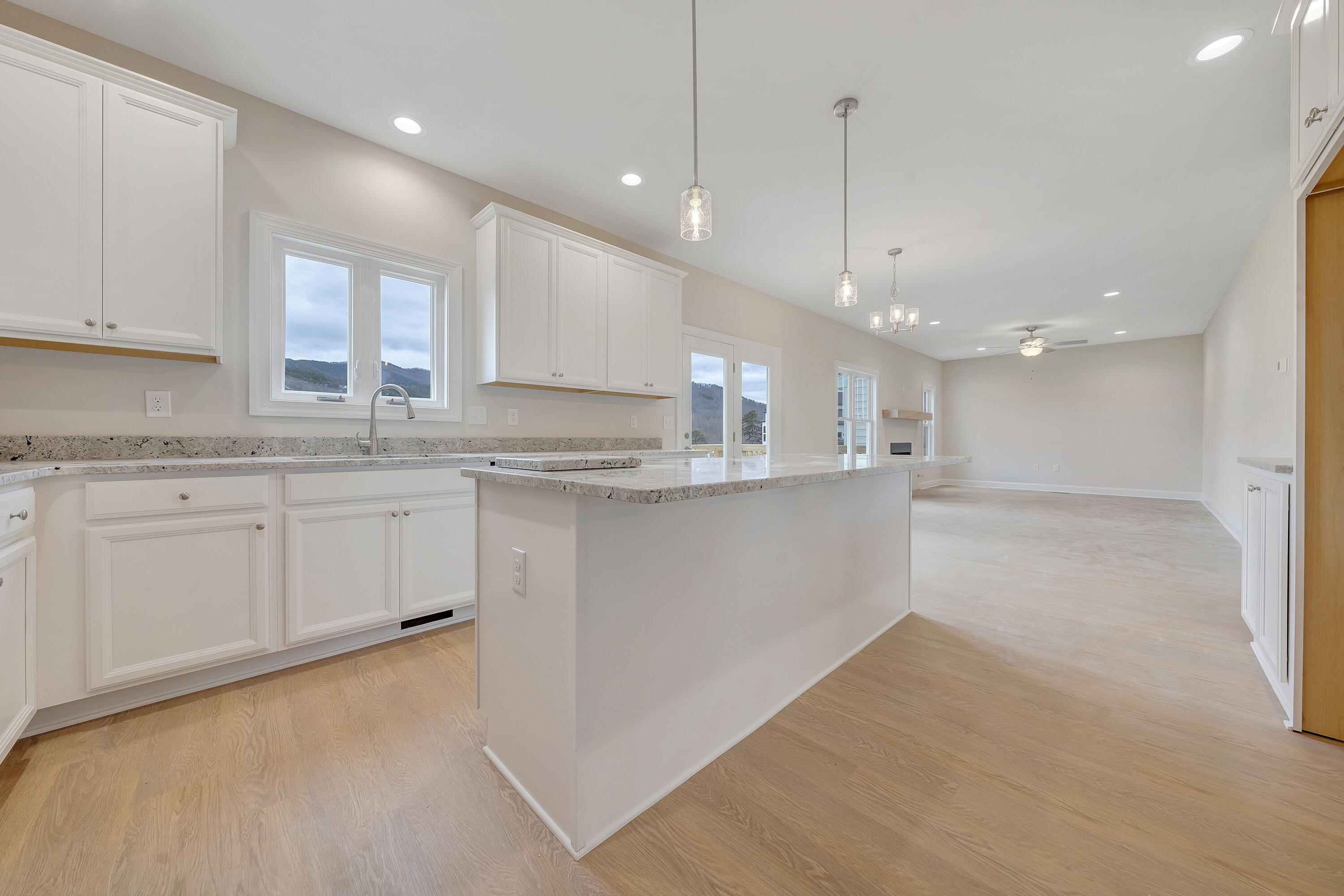 5275 Arrowhead Trail Salem, VA 24153 - Photo 7 of 18 a kitchen with kitchen island a sink stainless steel appliances and cabinets