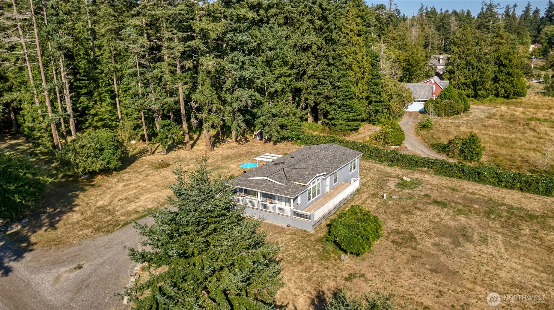 a aerial view of a house with a yard