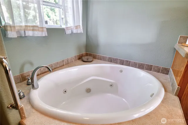 a bathroom with a bathtub