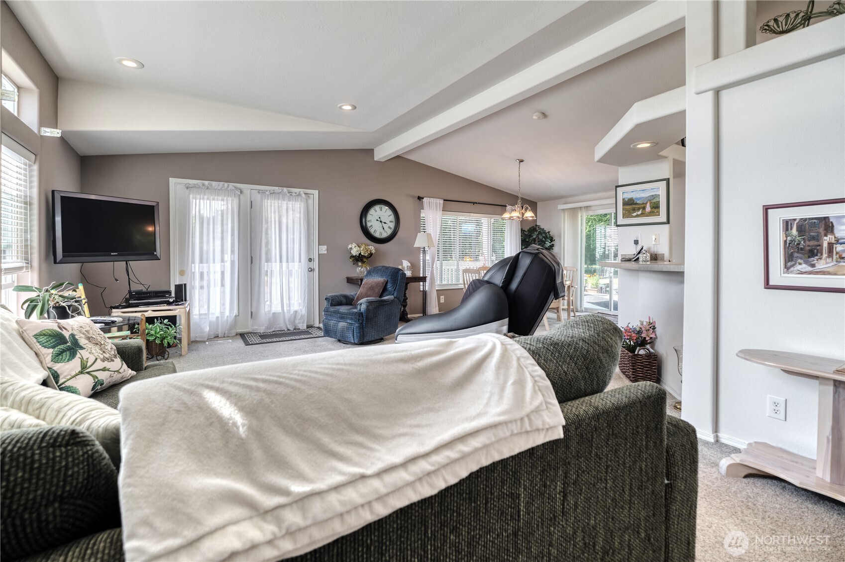 1940 APA Road Point Roberts, WA 98281 - Photo 5 of 35 a bedroom with a bed a mirror and a large window