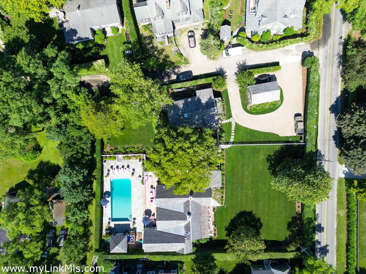 14 & 16 Coffin Street Nantucket, MA 02554 - Photo 48 of 50 an aerial view of a house with garden space and street view