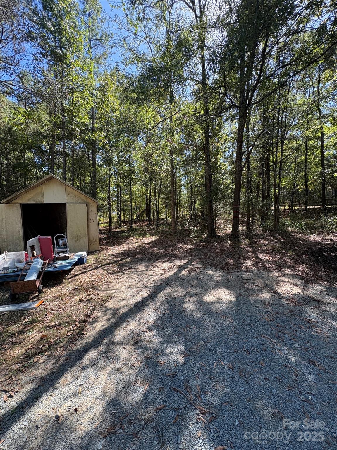 8101 Waxhaw Creek Road Waxhaw, NC 28173 - Photo 7 of 10 a view of a house with backyard