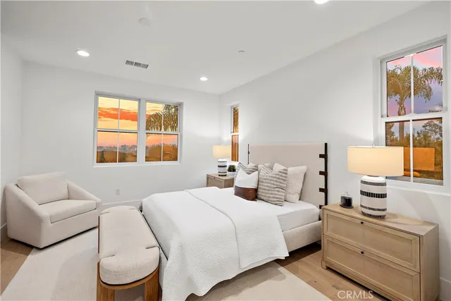 a view of a house with backyard porch and sitting area