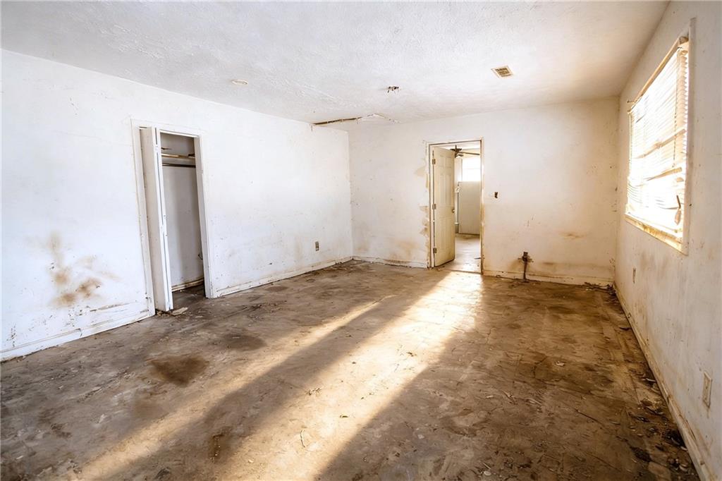 731 Bolton Road Northwest Atlanta, GA 30331 - Photo 15 of 20 a view of a room with window and stairs
