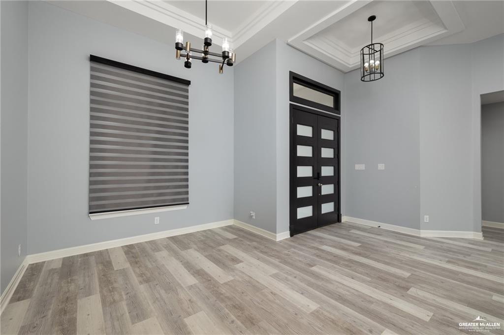 5904 North Dodger Street Pharr, TX 78577 - Photo 2 of 24 a view of an empty room with a window and closet