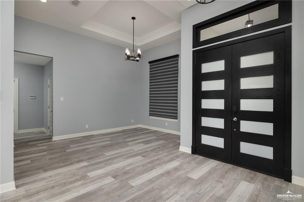 5904 North Dodger Street Pharr, TX 78577 - Photo 3 of 24 a view of a bedroom with a balcony