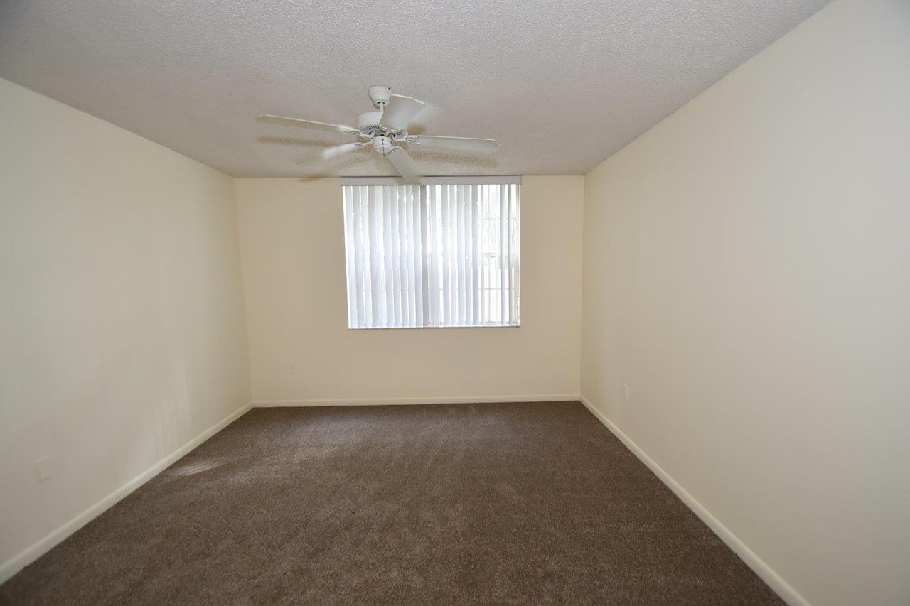 3237 Clint Moore Road, Unit 104 Boca Raton, FL 33496 - Photo 13 of 21 Master Bedroom