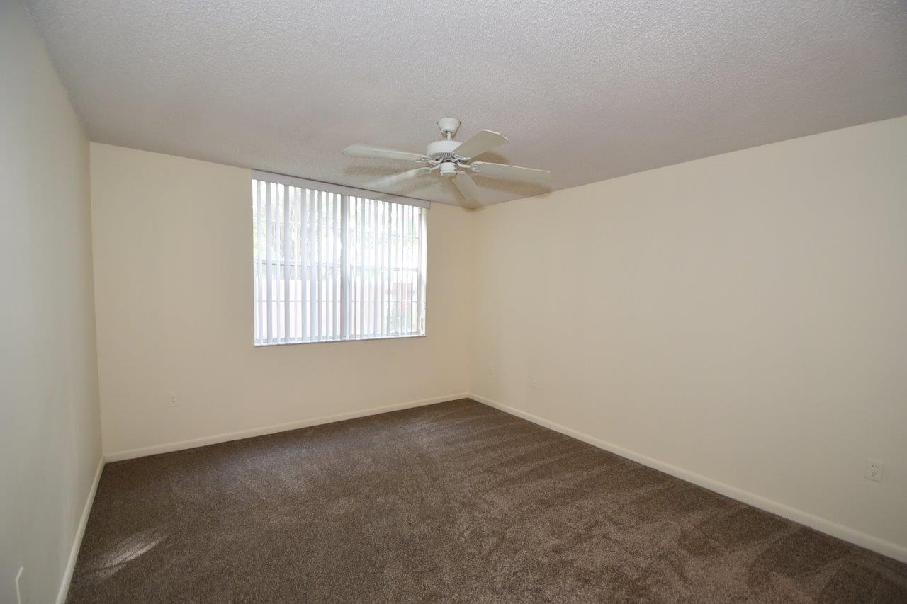 3237 Clint Moore Road, Unit 104 Boca Raton, FL 33496 - Photo 15 of 21 Master Bedroom