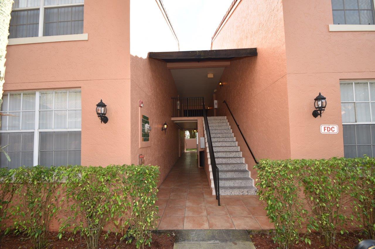 3237 Clint Moore Road, Unit 104 Boca Raton, FL 33496 - Photo 2 of 21 Front