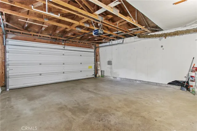 a view of a room with wooden walls