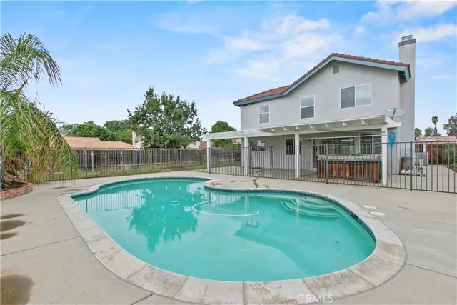 a view of a house with swimming pool