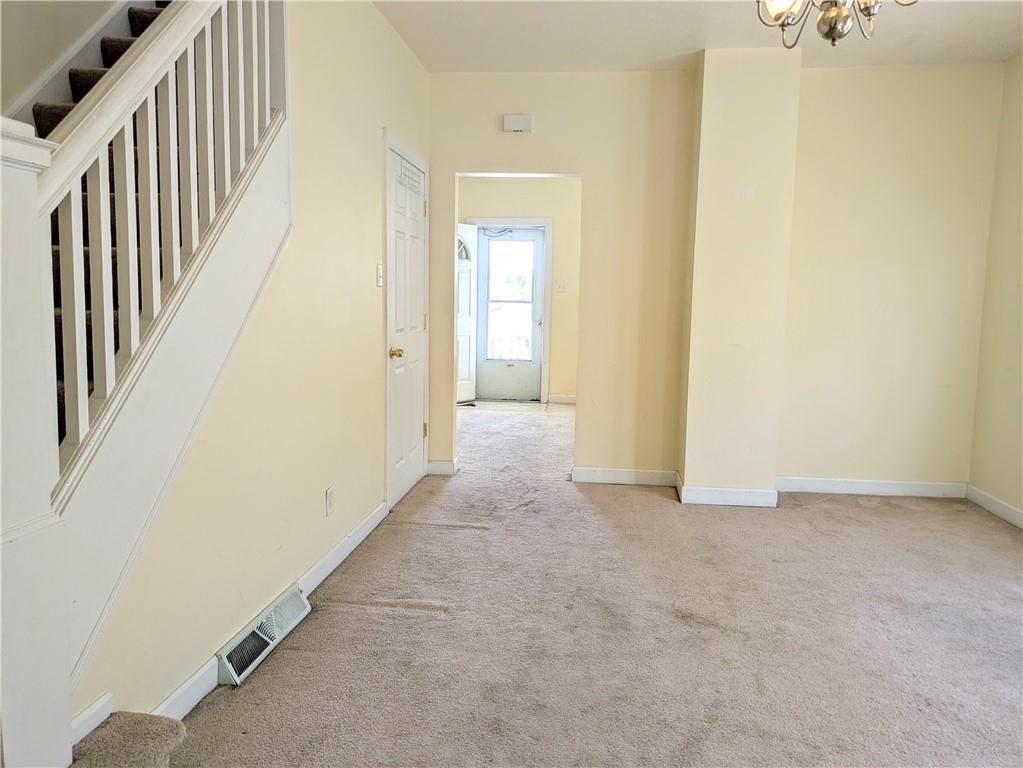 716 George Street Scottdale, PA 15683 - Photo 12 of 30 a view of a hallway with wooden floor and entryway