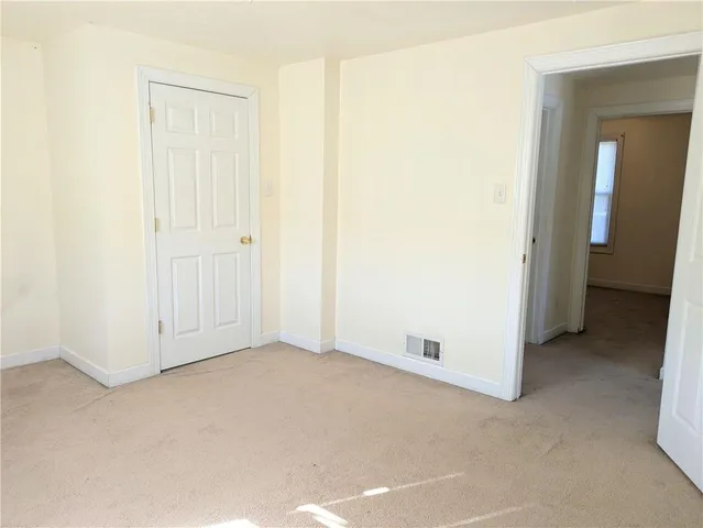 an empty room with closet