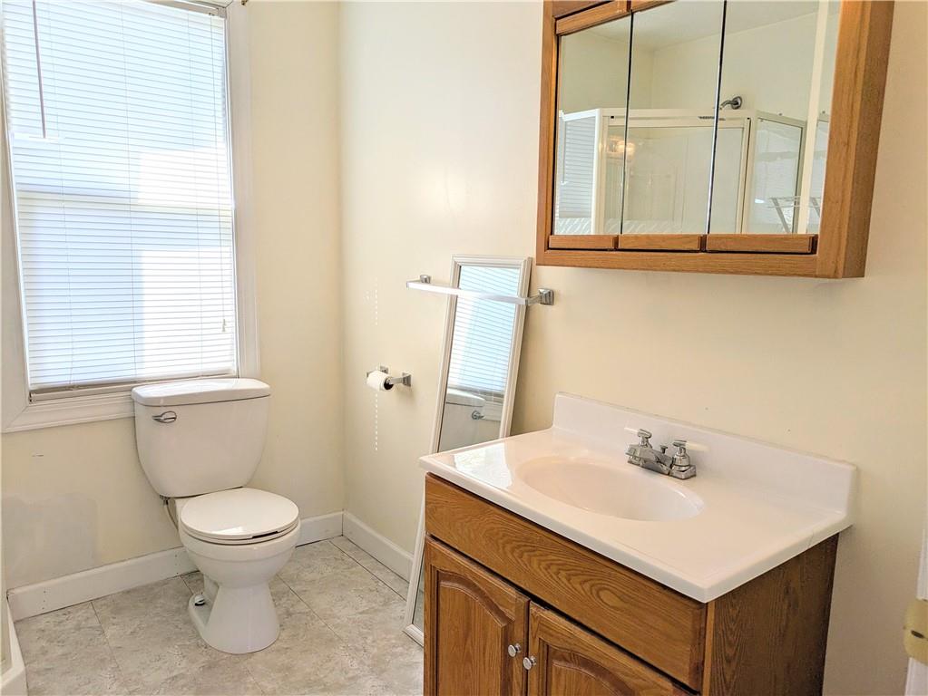 716 George Street Scottdale, PA 15683 - Photo 18 of 30 a bathroom with a sink and a toilet
