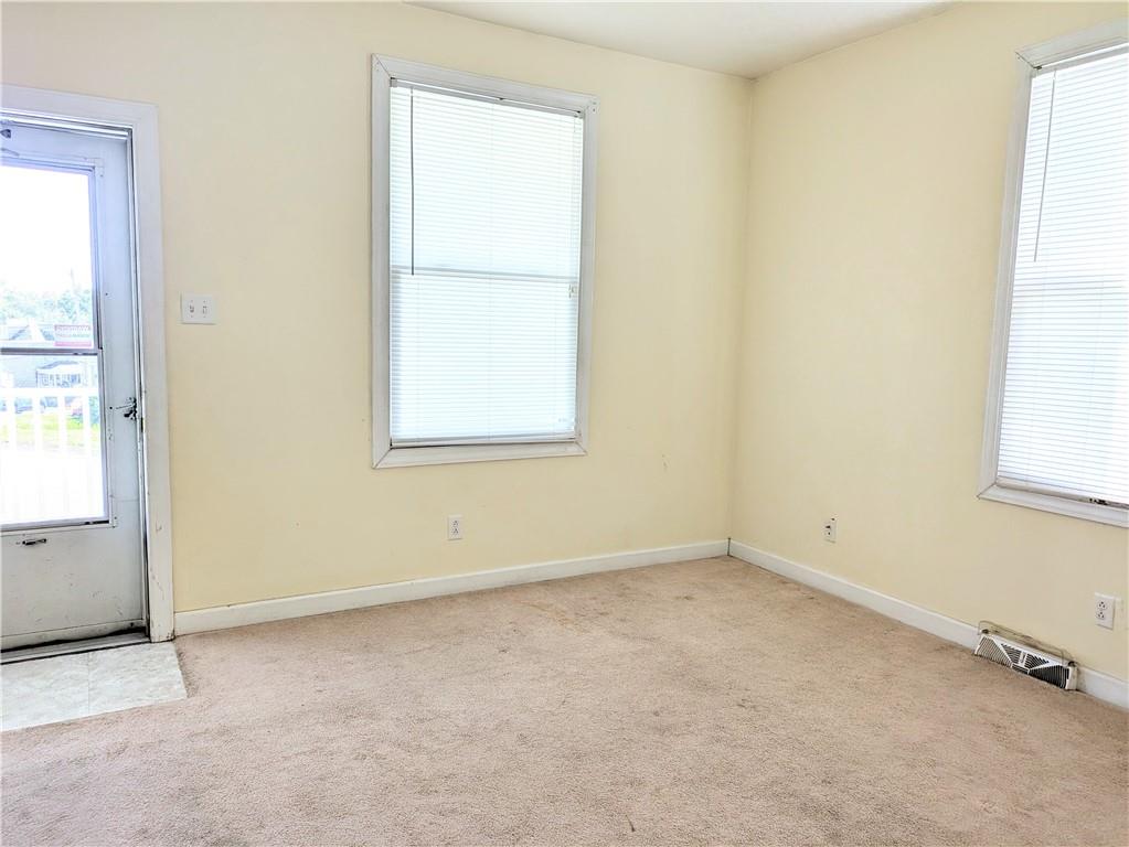 716 George Street Scottdale, PA 15683 - Photo 26 of 30 an empty room with windows
