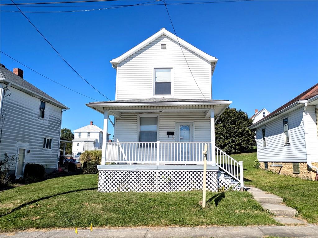 716 George Street Scottdale, PA 15683 - Photo 30 of 30 a front view of a house with a yard