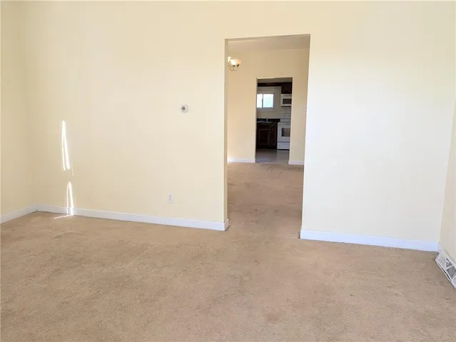 a view of a room with an empty space