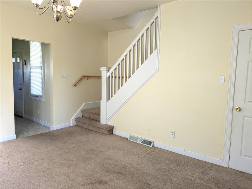 716 George Street Scottdale, PA 15683 - Photo 4 of 30 a view of a hallway with staircase