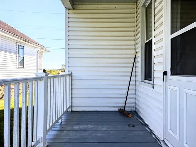 a view of a balcony with door